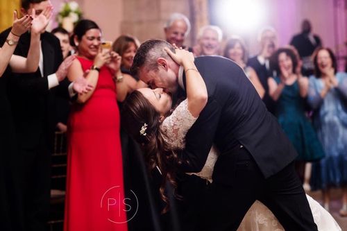Couple practicing their wedding first dance